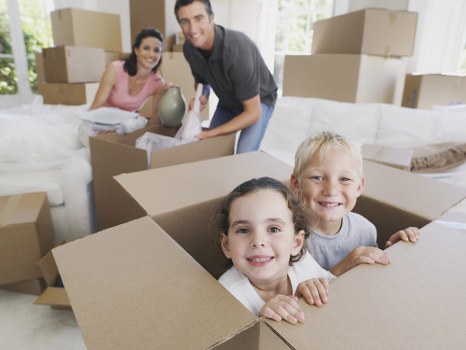 Packed moving boxes loaded into a removal van