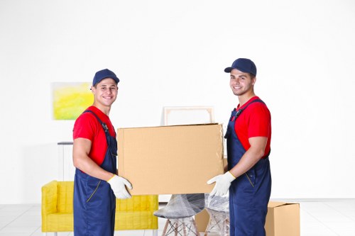Student removals team helping with boxes and furniture in Barnes