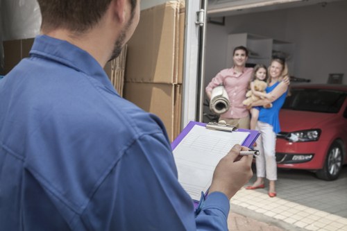 Professional Barnes moving service handling household items carefully