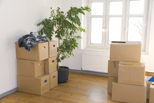 Packed office equipment ready for transport in Barnes