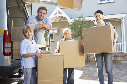Professional movers loading furniture during a Barnes house relocation