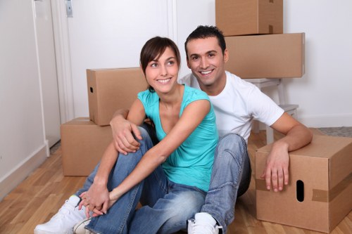 Team member loading items safely into a moving van