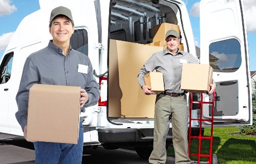 Barnes van and man loading furniture for delivery