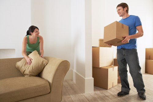 Local house removal team navigating a Barnes street during a residential move