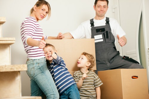 Local piano movers delivering an instrument to a Barnes property with care